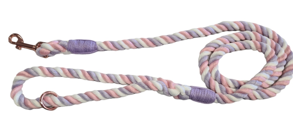 Tri-colour rope dog leash in lilac, pink and white on a white background